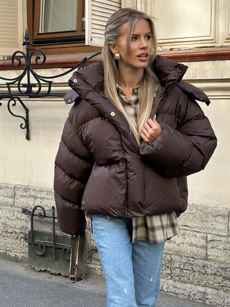 Collar vertical de otoño y invierno, temperamento de color sólido con sombrero, ropa de algodón de mangas largas para mujeres, 2025 nuevo estilo de invierno europeo y americano transfronterizo