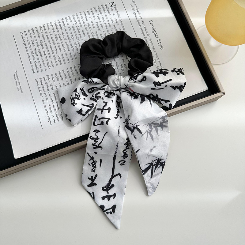 Anillo de cabello de arco femenino retro elegante correa francesa temperamento de alta sensación de impresión de anillo de intestino suave tocado versátil