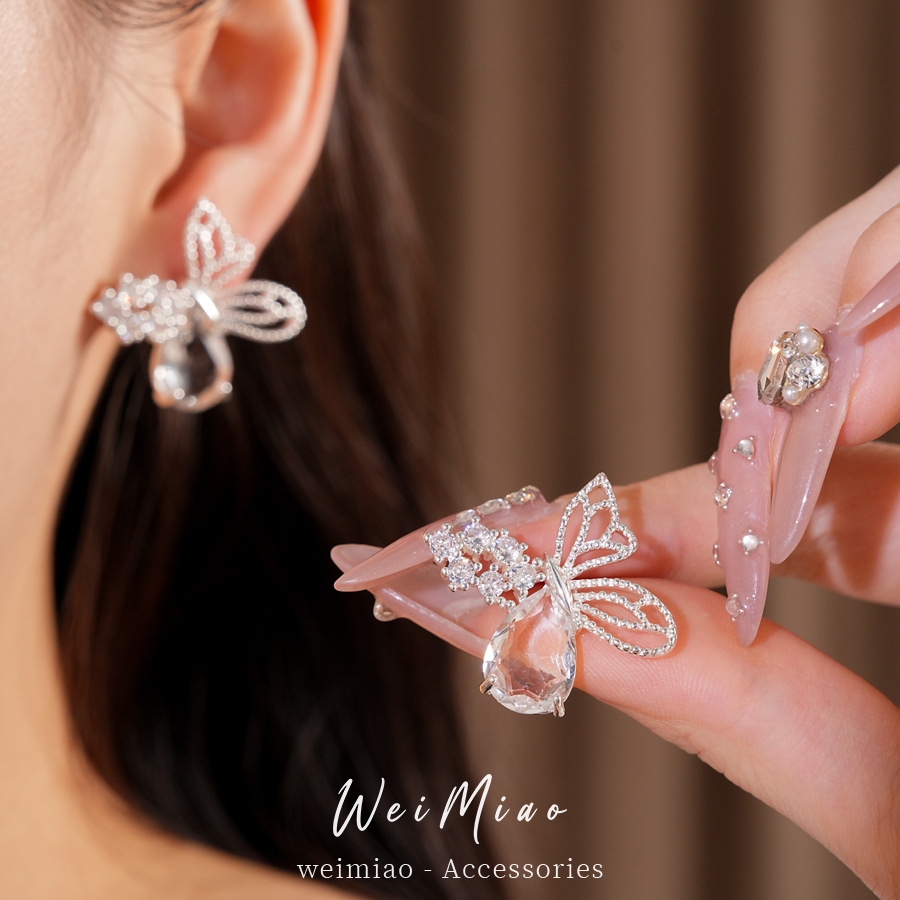 Agujas de plata, mariposas de piedra, gotas de agua, pernos huecos, nicho de moda, pendientes de lujo ligero, pendientes de alta calidad.