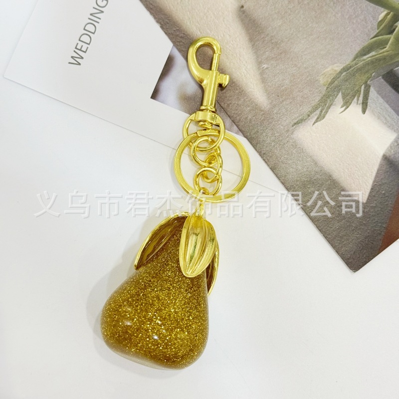 さくらんぼのキーホルダーアクセサリーのバッグのストラップがおしゃれで美しい水晶樹脂車センチ車のキーホルダーの女性