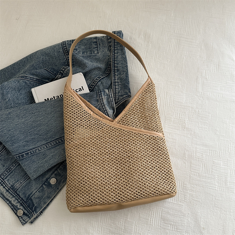 Popular bolsa de tejido de gran capacidad para mujeres 2024 verano nueva bolsa de hombro universal bolsa de viaje de moda