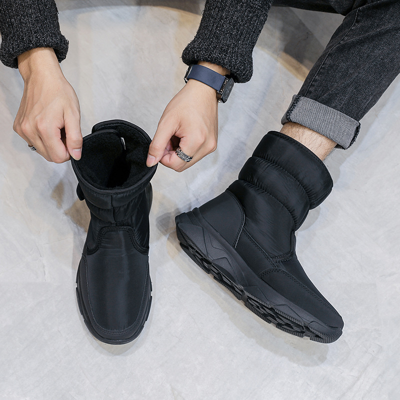 2021 nueva versión pública de los hombres botas de nieve zapatos de algodón caliente negro más tamaño de goma de una sola pieza entrega al por mayor comercio exterior transfronterizo