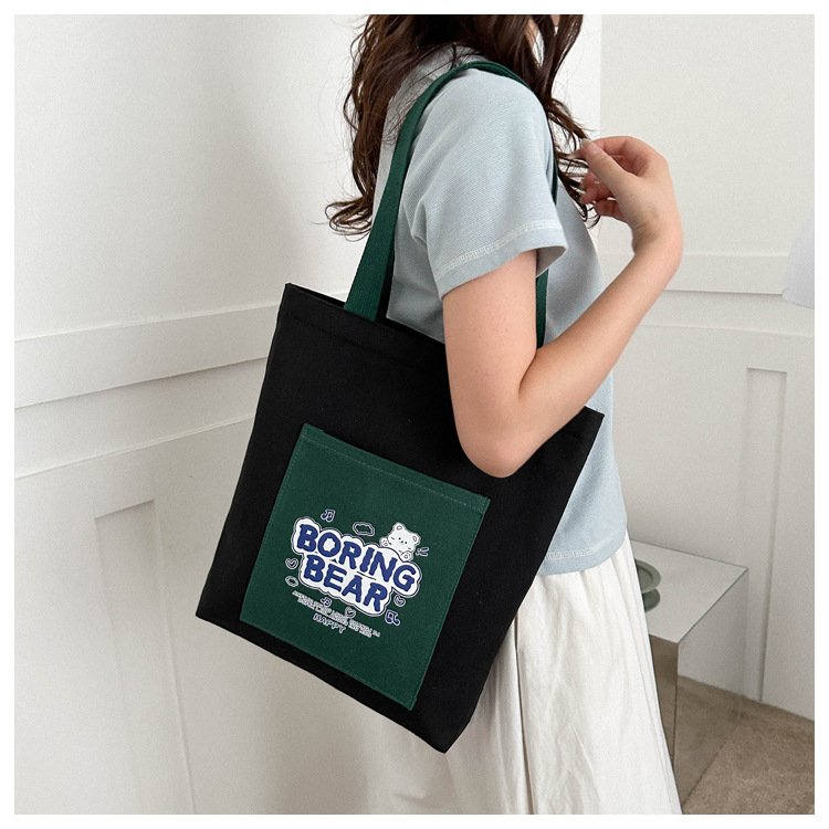 Wholesale of 2025 new casual and fashionable canvas bags, large-capacity single-shoulder bags for college students' shopping, and trendy tote bags undefined