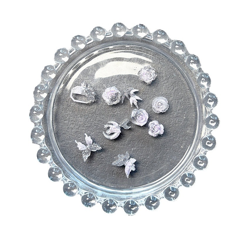 Nueva joyería de uñas de estilo gris-púrpura salvaje de estilo ins mezclada luminosa tridimensional de flores pequeñas accesorios de armadura al por mayor