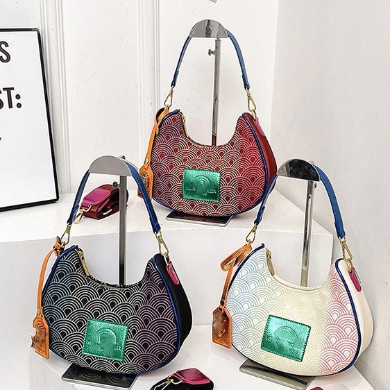 2025 bolso de mujer, personalidad de nicho de alta gama, bolso de axila de color degradado, bolso de axila de hombro, venta caliente transfronteriza, bolso de luna nueva