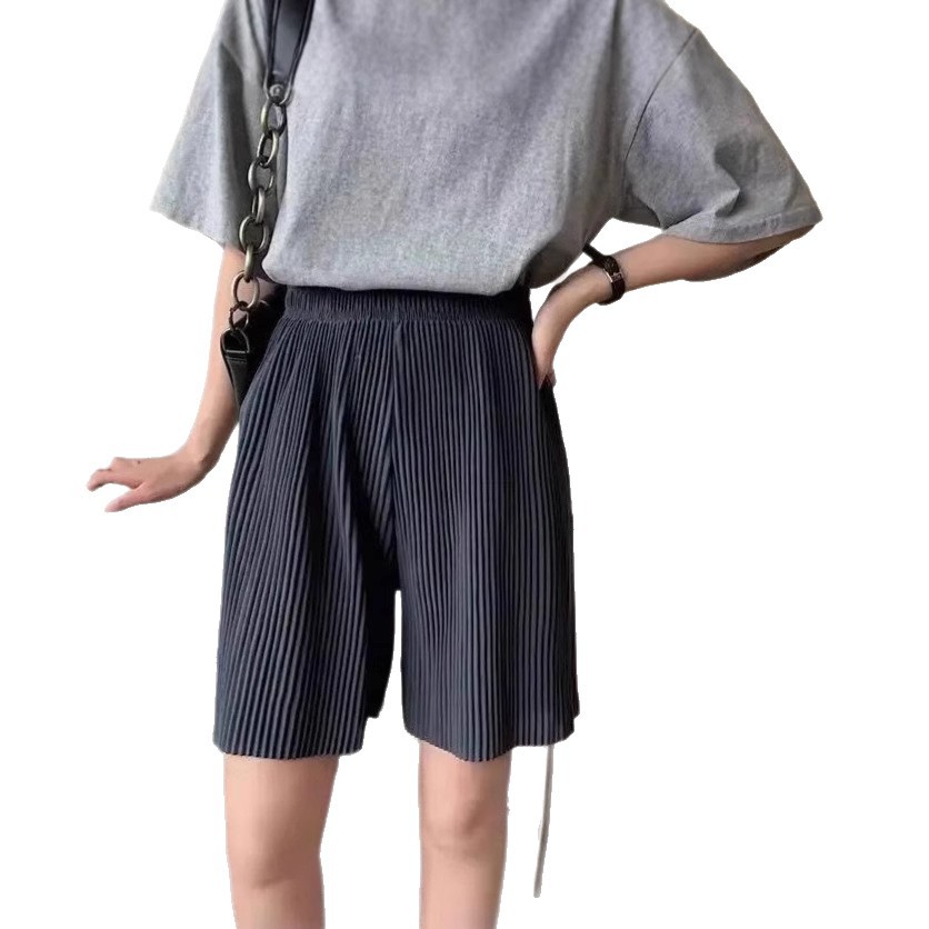 2025 nuevos pantalones cortos de pierna ancha plisados para mujer, pantalones de cinco puntos que cubren la carne de verano de estilo coreano, cintura elástica suelta y versátil, descanso recto