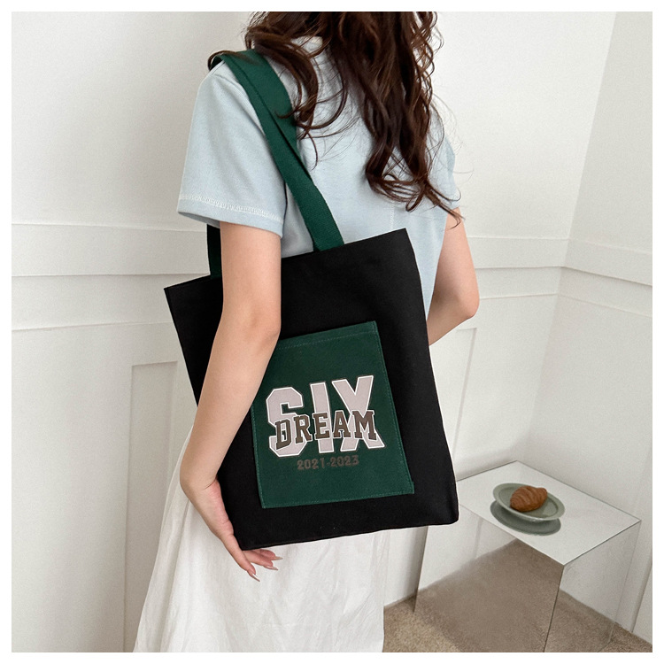 Wholesale of 2025 new casual and fashionable canvas bags, large-capacity single-shoulder bags for college students' shopping, and trendy tote bags undefined