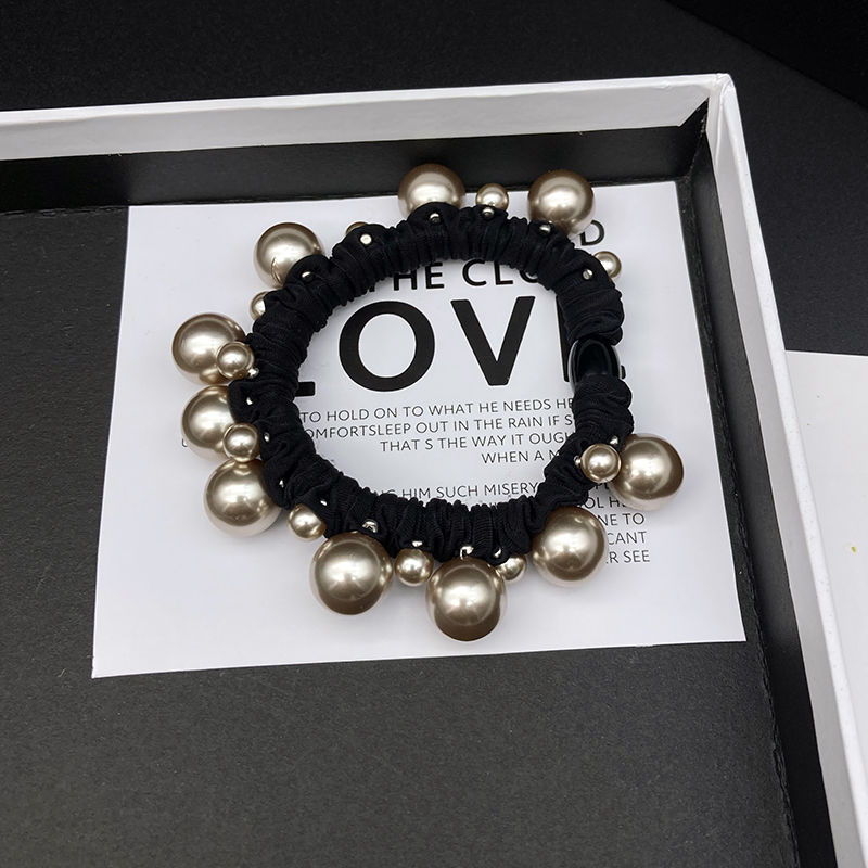 2025 nuevo estilo de cuerda de cabeza simple anillo de pelo de perlas anillo de intestino grande temperamento de alta elasticidad correa gruesa cuerda de pelo de mujer