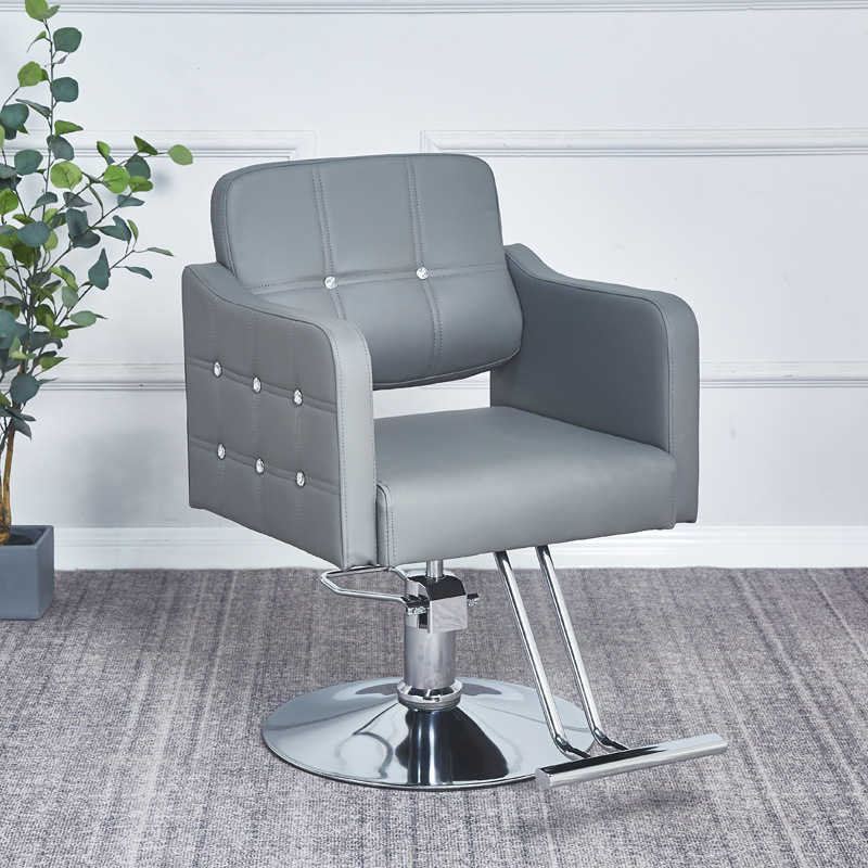 Fabricantes de sillas de peluquería al por mayor silla de cuero retro de alta gama de estilo europeo silla de peluquería minimalista moderna silla de corte de peluquería