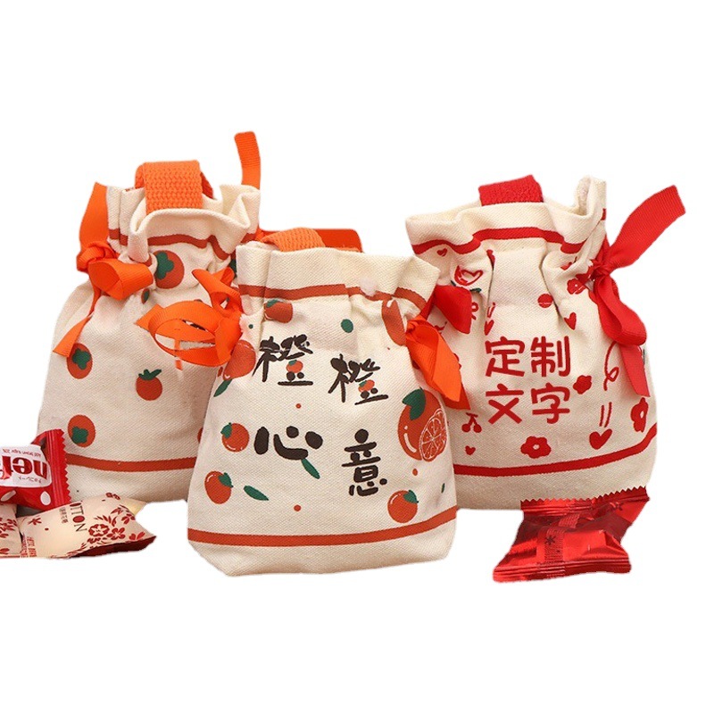 Fábrica al por mayor regalo de mano en stock bolsa de lona portátil pequeña bolsa de suerte bolsa de caramelo bolsa de lazo de logotipo impreso personalizado