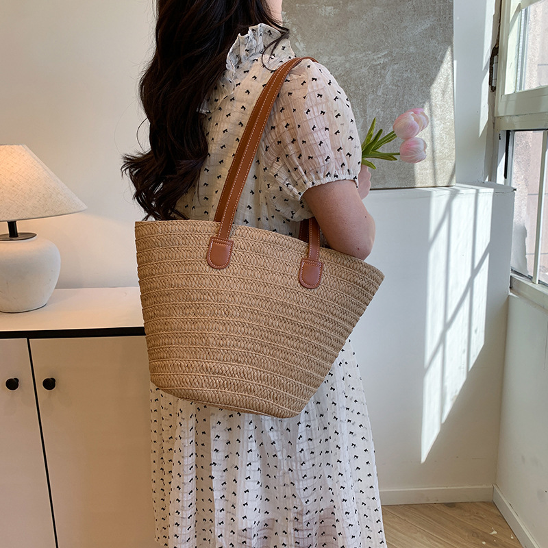 Capacious straw woven basket