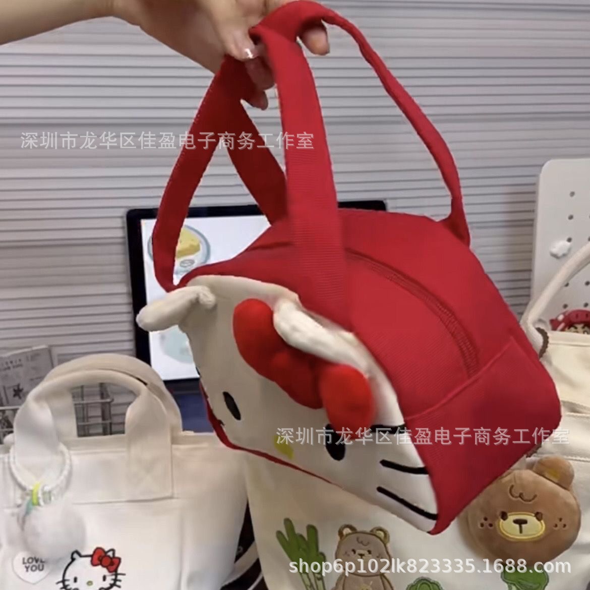 HelloKitty帆布手提包包女凯蒂猫手领包可爱三丽鸥大容量便当包-阿里巴巴