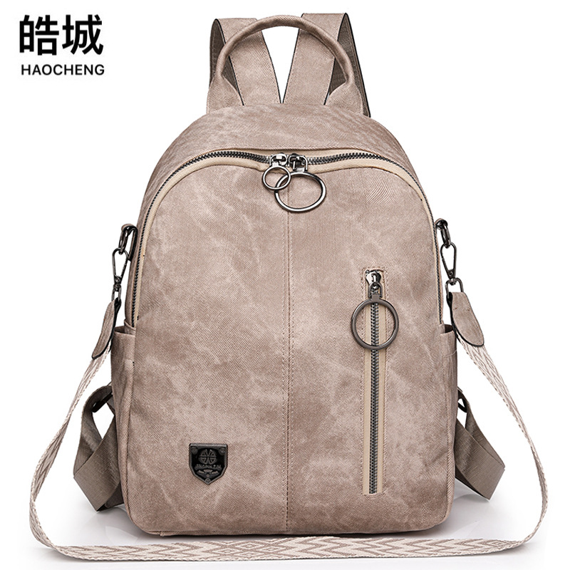 Comercio exterior al por mayor nueva versión coreana de la mochila de cuero suave para mujer simple retro de gran capacidad mochila de viaje de doble uso mochila escolar