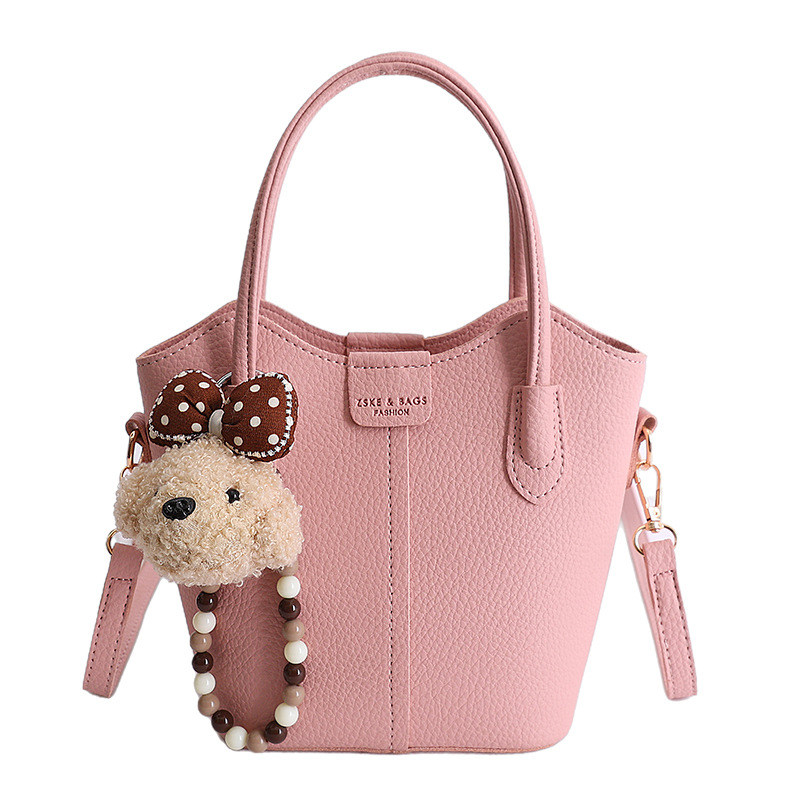 Bolso de mano de moda retro 2026 nuevo temperamento simple bolso de cubo de viaje ocio mochila de hombro