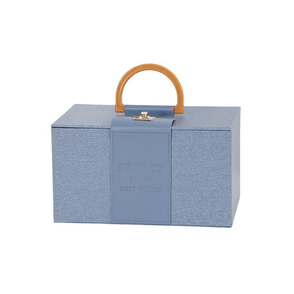 2023 nueva caja de regalo portátil regalo Festival de Primavera caja de embalaje de cuero caja de dulces de boda caja de regalo de mano al por mayor