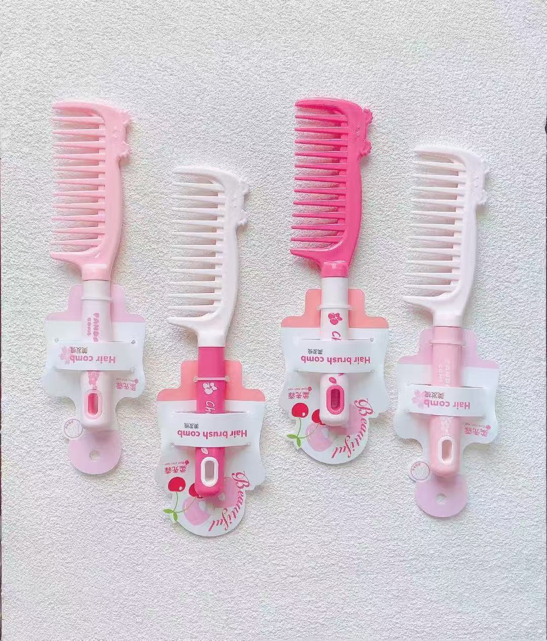 Nuevo paquete de impresión de cuerda de colgante independiente de trigo rollo de peinado de plástico peinado de belleza tienda de dos yuanes asequible