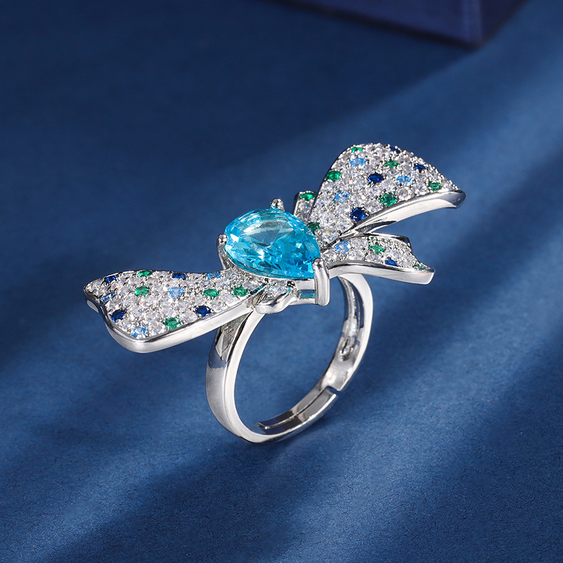 Zhuang Sheng joyas de cobre inferior chapado en oro coreano ins moda simulación color tesoro arco anillo piedra principal 8*14