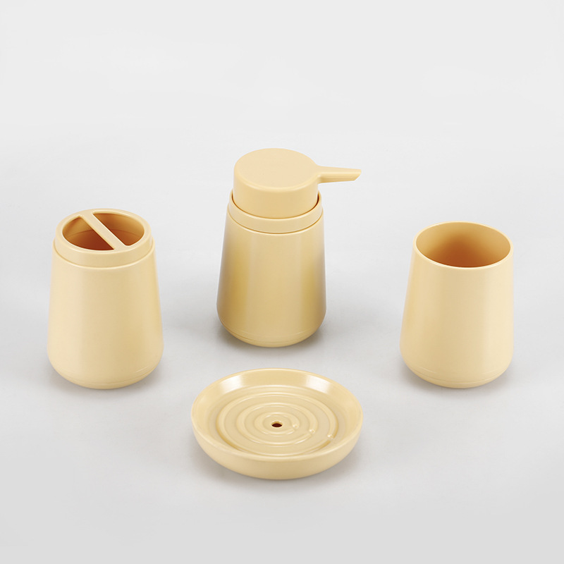 Color sólido nuevo baño de plástico suministros de cuatro piezas conjunto enjuague bucal cepillado rack hogar caja de jabón Baño de almacenamiento cubierta de baño