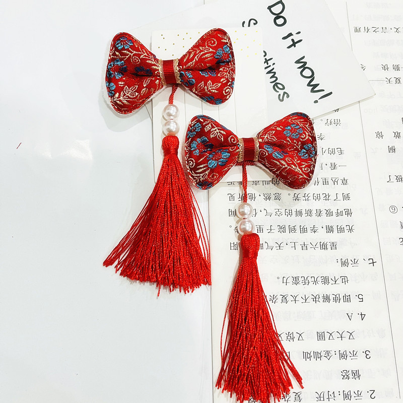 红色毛球珍珠流苏发夹