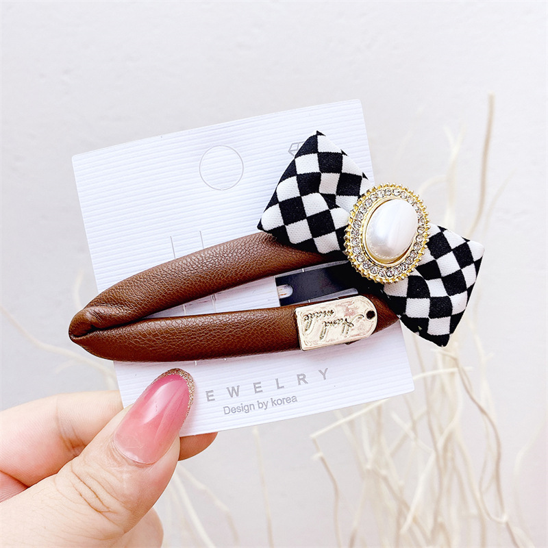 【月銷(xiāo)3000】韓國(guó)新款皮質(zhì)菱格棋盤(pán)格PU皮質(zhì)蝴蝶結(jié)BB夾