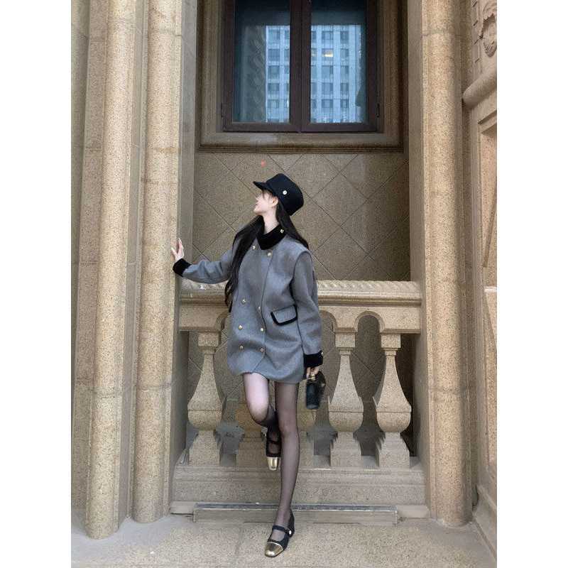 Sophisticated Chanel-inspired, stylish double-breasted wool coat with stand-up collar and color-blocked design, exuding a slimming and elegant vibe.