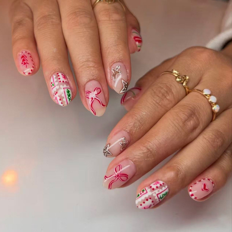Winter Christmas red bow Christmas tree gingerbread graffiti design short oval press-on nails Winter Christmas red bow Christmas tree gingerbread graffiti design short oval press-on nails