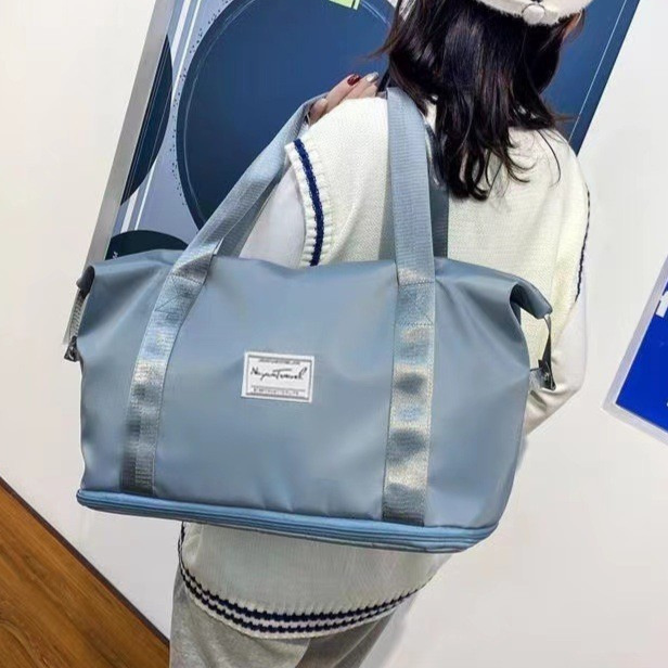 旅行のフィットネスバッグの荷物は女性の短距離旅行袋を包んで外出します。|undefined