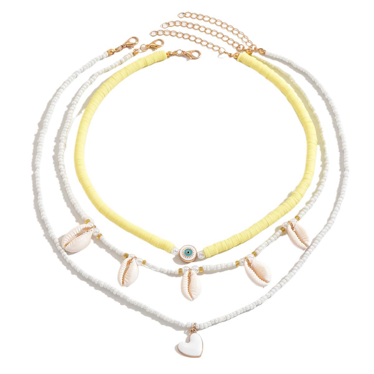 Colar feminino boêmio, modelo novo e super em alta, com pingente de coração em formato de concha cauda de peixe._voghion.com