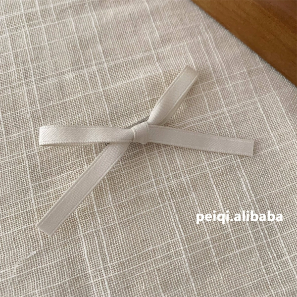 White hair band with bow, hairgrip