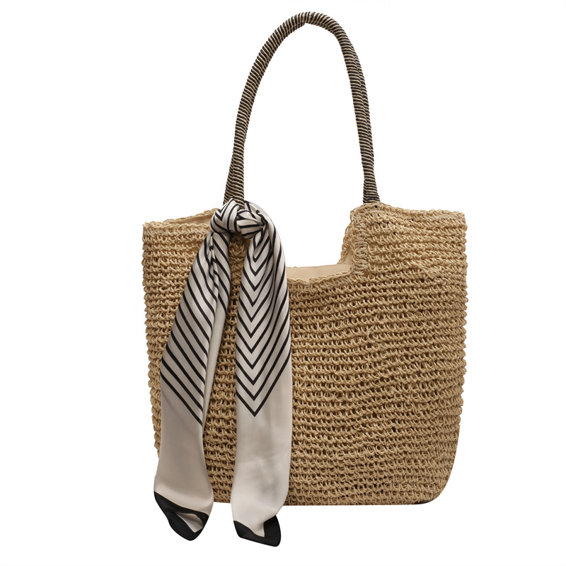 Bolsos de paja populares de verano para mujer 2025 nuevo bolso de tote hueco tejido más vendido bolso de mujer de viaje de gran capacidad