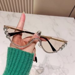 新型欧米のファッション猫の目の半枠のサングラスの女性はドリルを入れます。