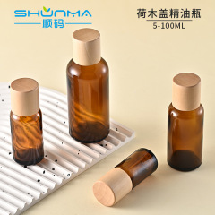 5ml-100mlハスの木の蓋の精油の瓶の盗難防止の蓋の茶色のガラス瓶の大容量の精華の原液は瓶を分けます。