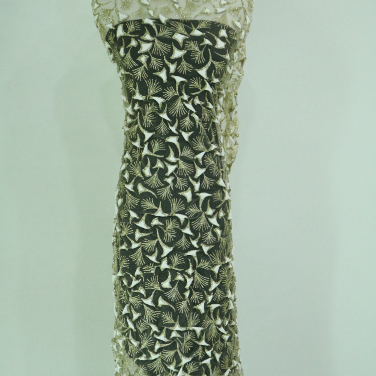 Nuevo tipo de tela de malla primavera y otoño tela espumosa dorada tela de vestido de boda