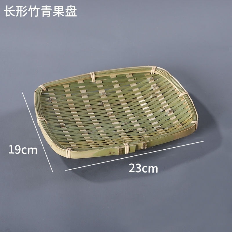 手作りの竹の編み製品の小さい竹のかごの丸い棚は箕のホテルのレストランの間食の果物のお菓子の皿のマントーのかごを振りかけます。|undefined
