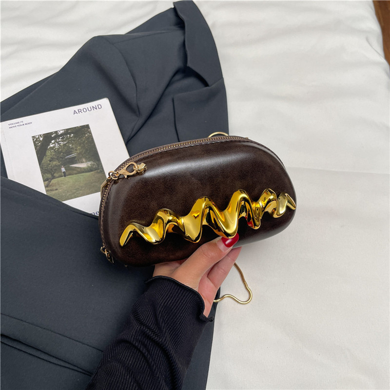 Bolso de mano de moda europea y americana personalidad para mujeres 2025 nueva cadena de moda bolso de cena bolso de hombro bolso de caja diagonal