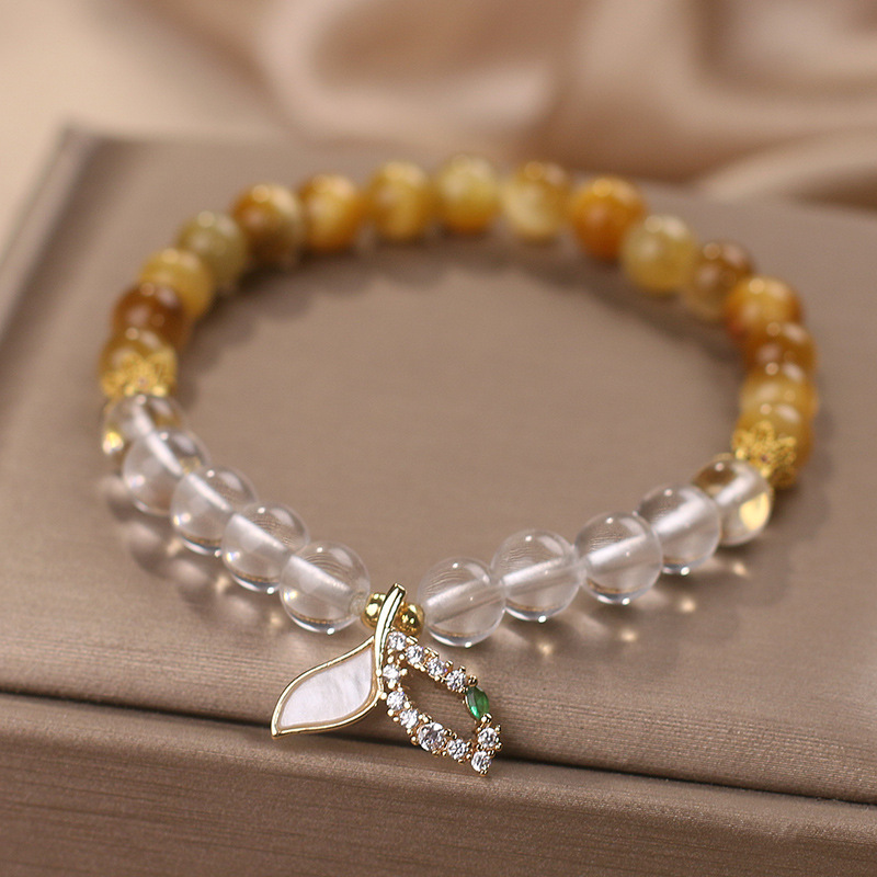 Natural oro tigre ojo piedra pulsera de cristal blanco mujer de alto nivel sensación colgante de cola de pez pulsera ligera lujo nicho joyería de mano