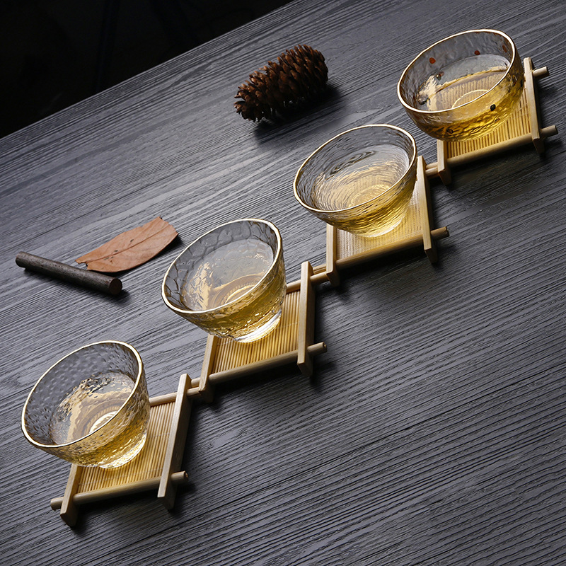 Patrón de martillo Xingran vidrio resistente al calor Taza de té de tres patas de oro juego de té de Kung Fu Propietario de una sola taza patrón de martillo de borde dorado taza de té pequeña