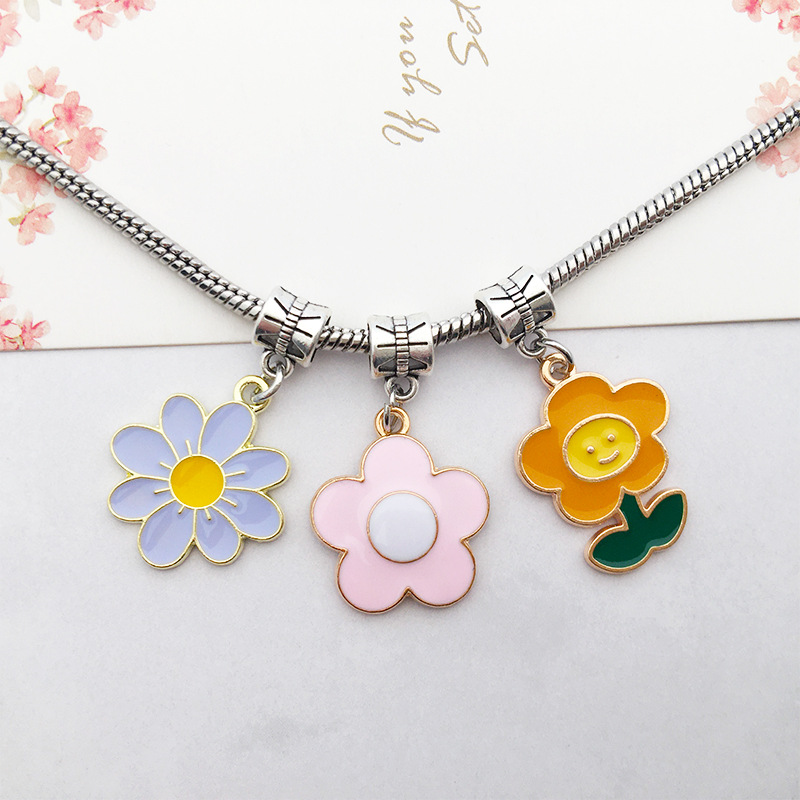 1 gota de aceite flor girasol DIY joyería accesorios aleación color flor collar pendientes colgante estilo coreano