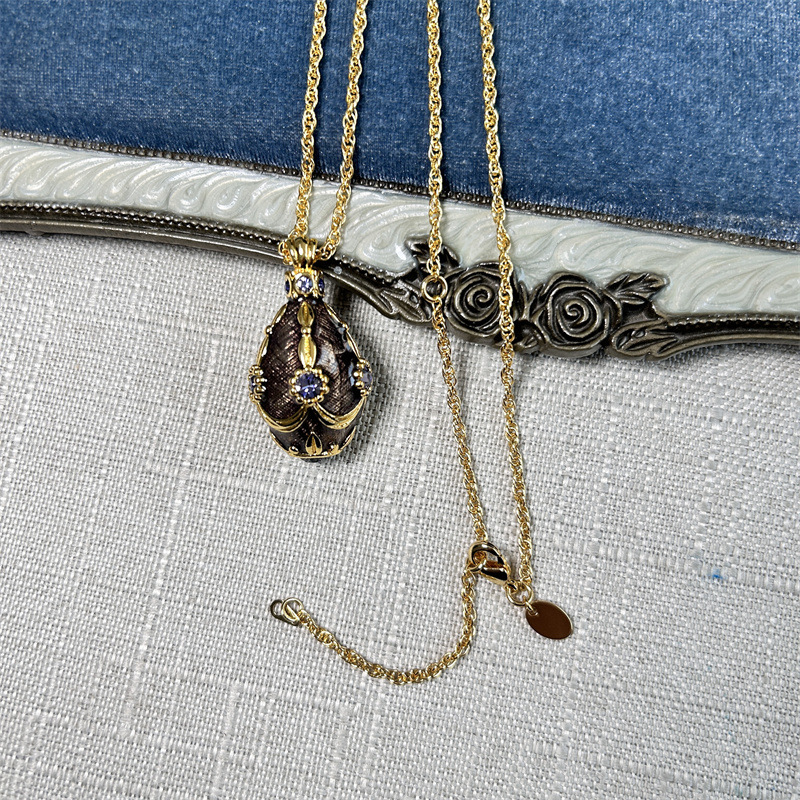Vintage Russian Egg Necklace With Purple Enamel & Diamond Detail_voghion.com