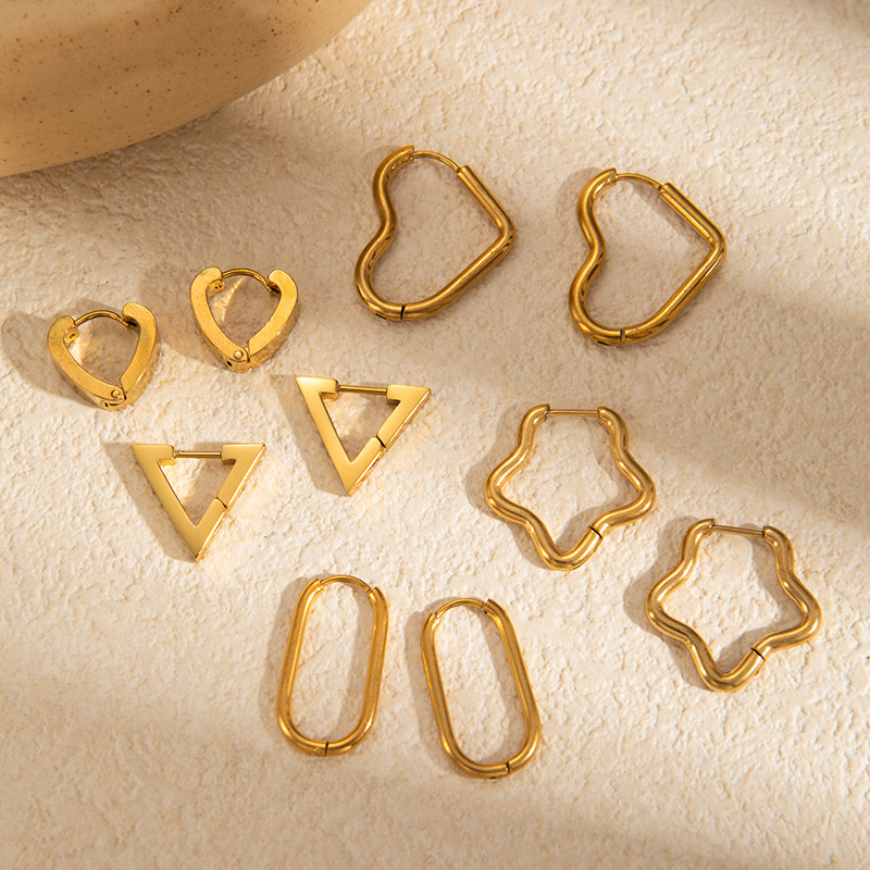 Pendientes geométricos estilo coreano, pendientes de acero inoxidable, diseño de moda de lujo ligero, pendientes de titanio con forma de corazón y estrella para mujer, transfronterizos.