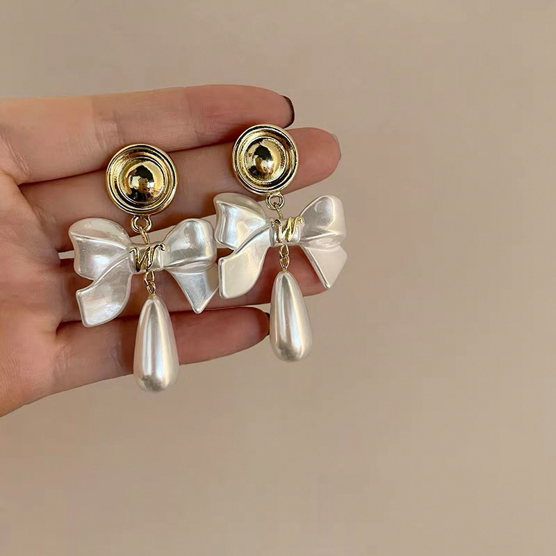 Pendientes de perlas con borla de flores de alta calidad con aguja de plata Pendientes de todo fósforo de moda francesa de nuevo estilo Pendientes de alta calidad de lujo ligero