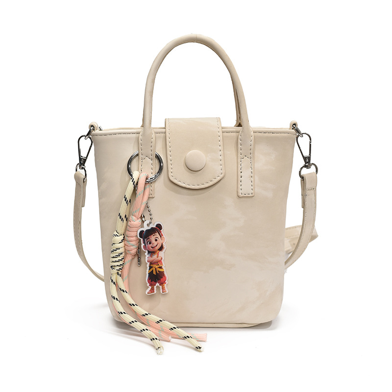 Verano super caliente mini bolso de mano para mujeres 2025 nueva moda bolso de balde de moda explosión de textura universal mochila