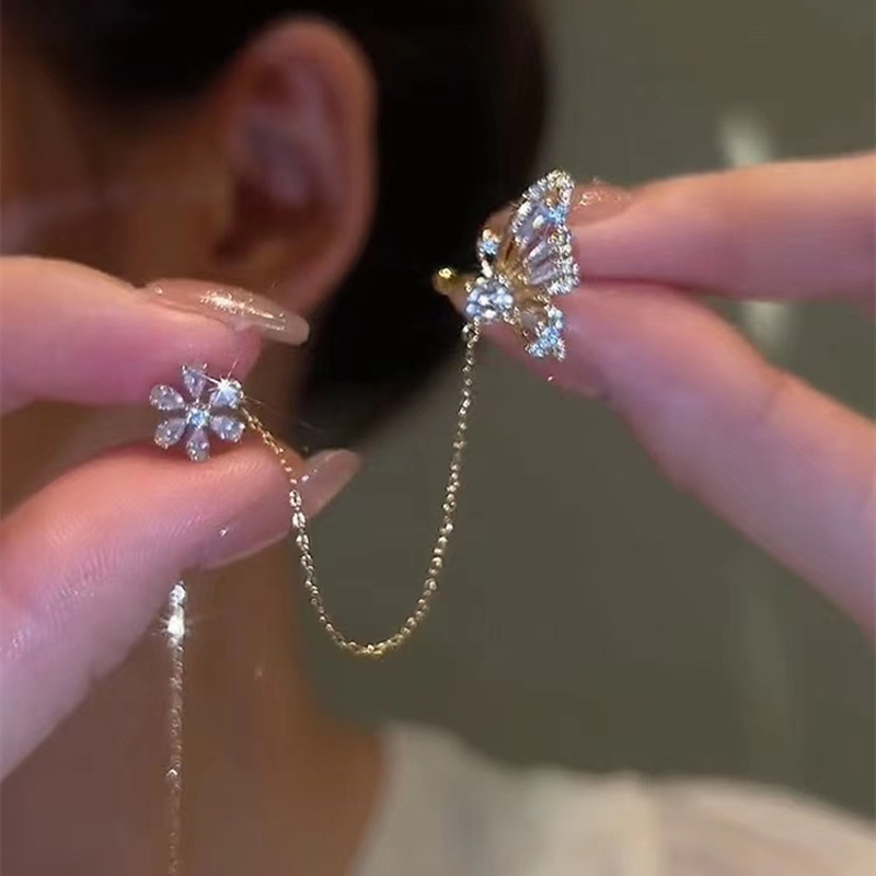Mariposa amor flor oído hueso clip oreja línea integrada pendientes nicho diseño de alto grado de luz clip de oreja de lujo borla temperamento pendientes