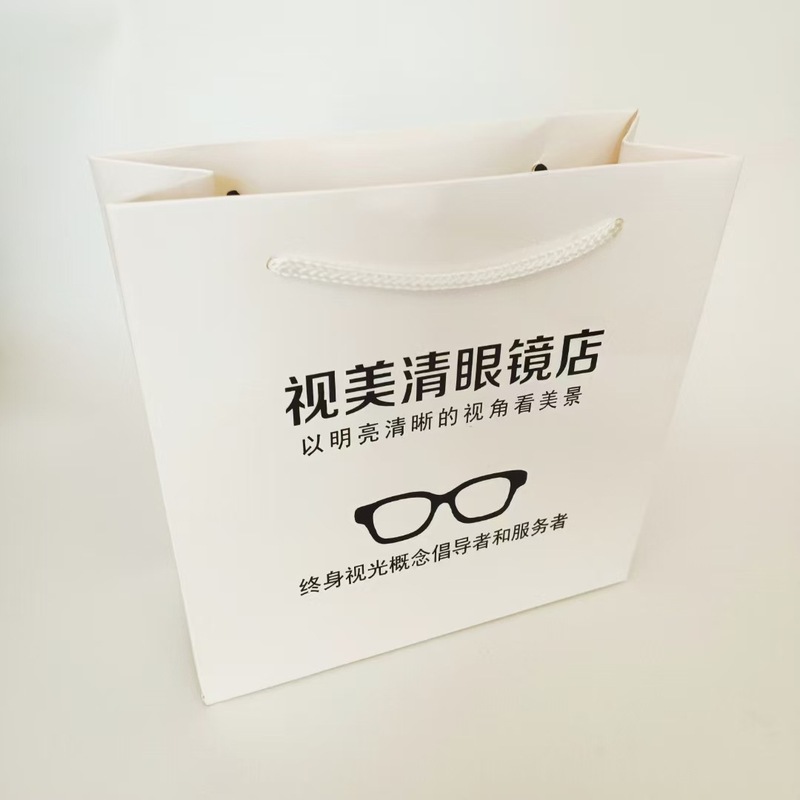 ハンドバッグカスタムロゴメガネ店紙袋衣料品店企業ギフトバッグ紙ショッピングバッグホットスタンピング紙袋|undefined