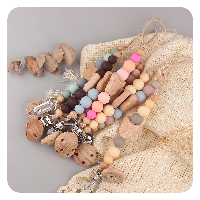 Productos para bebés Clip de chupete de madera de haya Dibujos animados de bebé creativo Oso de madera de haya Muerde los dientes Cadena de chupete anti-caída