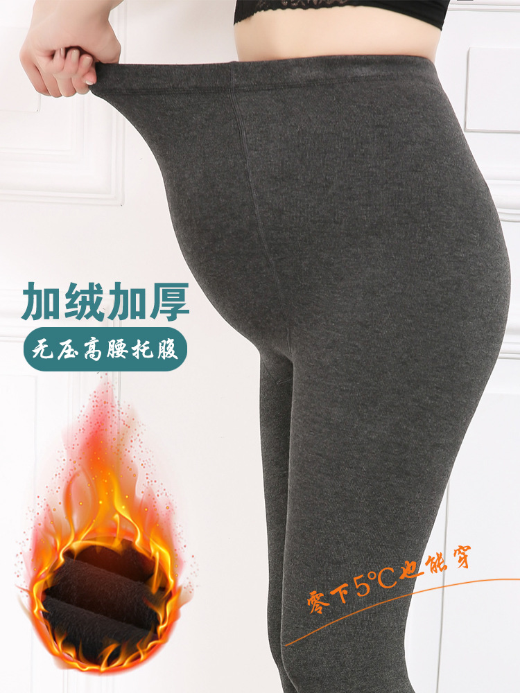 妊婦のレギンスの秋冬のベルベットの縦縞の綿の大きいサイズの妊娠期間のズボンの靴下は足を踏んで腹を支えて女性の妊婦の服を調節することができます。