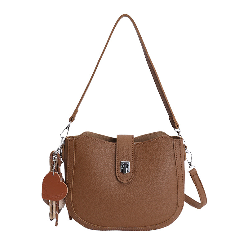 Hot sale nuevo nicho coreano litchi estampado bolso de cubo de hombro para mujeres sensación de lujo ligero versátil bolso de transporte de viaje