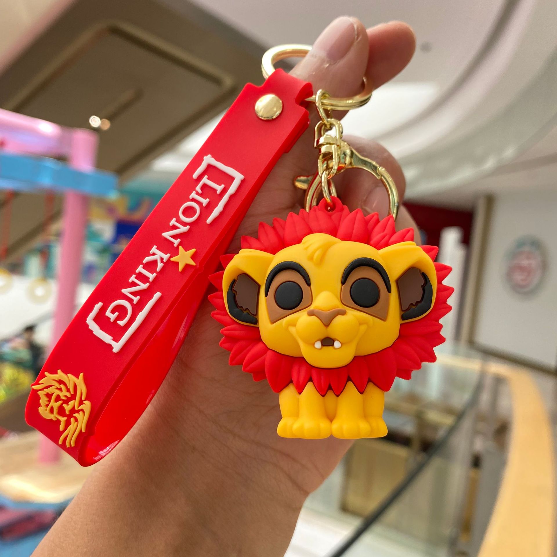 Creativo de dibujos animados lindo Simba Rey León llavero muñeca captura bebé máquina colgante bolsa accesorios pequeño regalo al por mayor