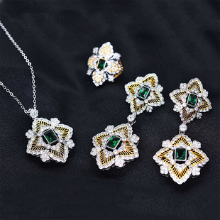 European and American new textured carved gold imitation emerald suit lace hollow filigree ring long earrings green diamond necklace