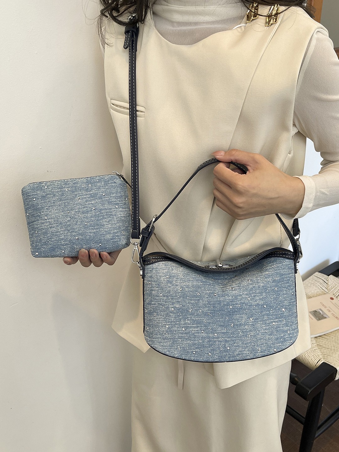 Bolsa de mano de denim coreana simple 2026 nueva moda alta textura extranjera versátil mochila de hombro